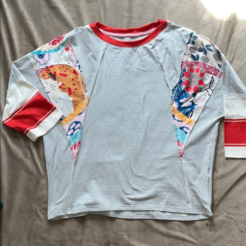 Women’s White Stripe Raglan Tee with Orange Trim and Floral Patchwork
